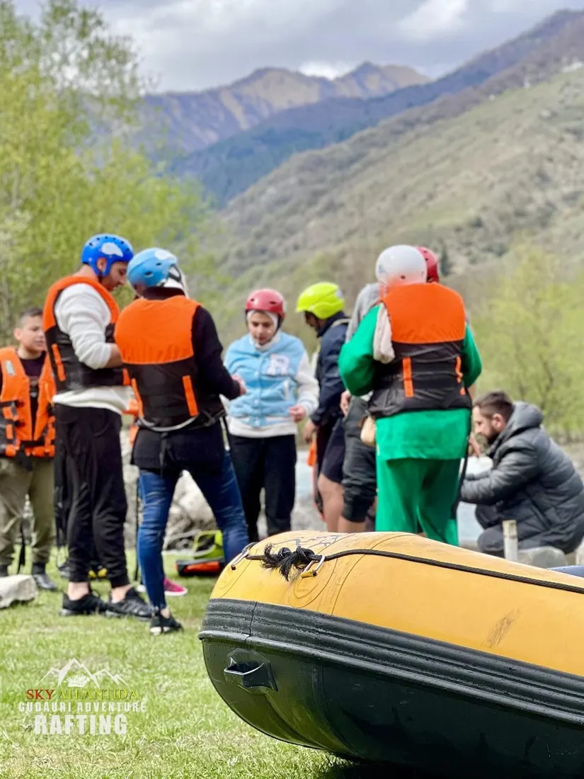Rafting group preparing on the riverbank